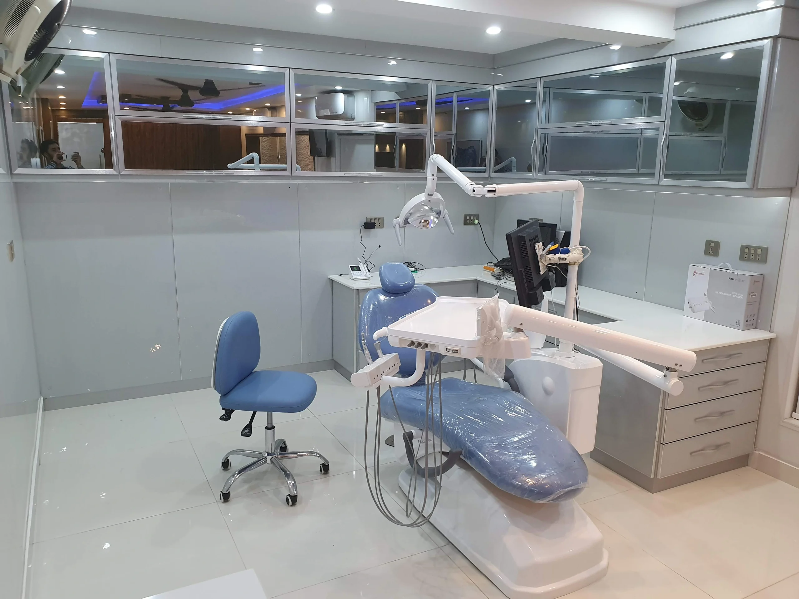 Patient receiving dental care at Dental Solutions by Dr. Umer Arshad in Sargodha.