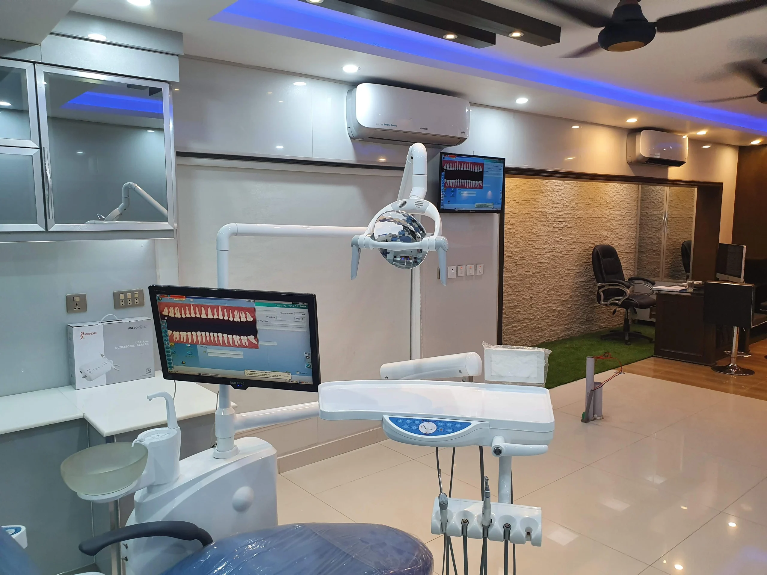 Dr. Umer Arshad providing dental treatment at Dental Solutions in Sargodha