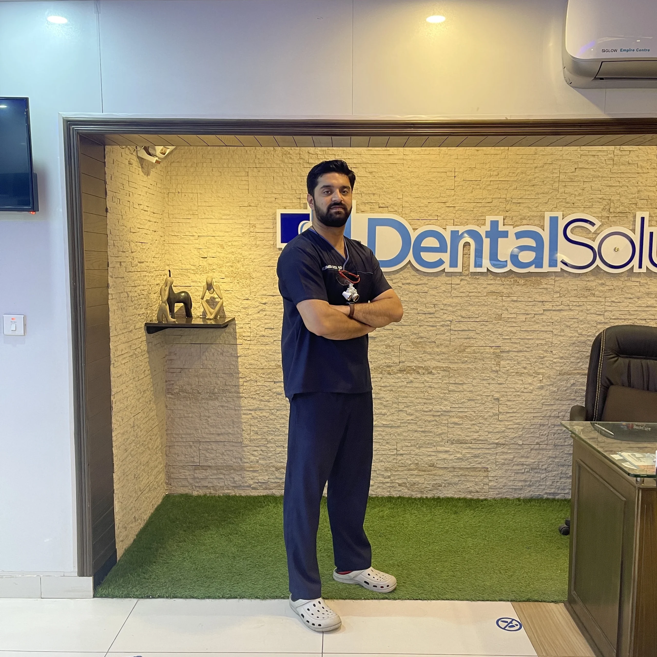 Portrait of Dr. Umer Arshad, dentist at Dental Solutions in Sargodha.